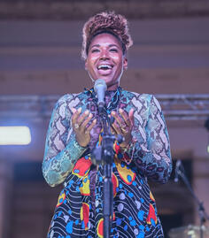 Adora Aiza takes center stage and the crowd goes silent in awe as she opens with just her voice. Adora Aiza takes center stage and the crowd goes silent in awe as she opens with just her voice.